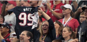 Los fanáticos de los Texans celebran su primer triunfo en los play off